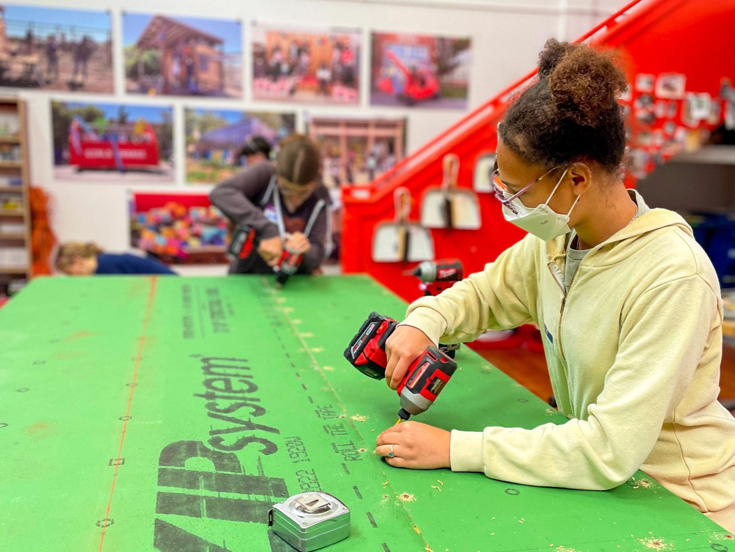 masked girls prepping Zip insulator