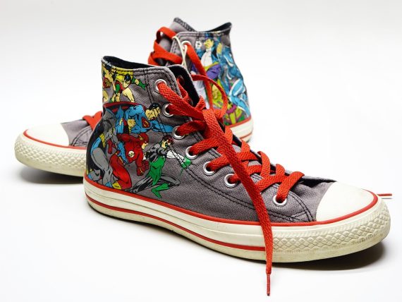 Photo of Converse high-top canvas shoes imprinted with action-hero comic figures 