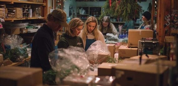 Photo of employees in a small shop-like business