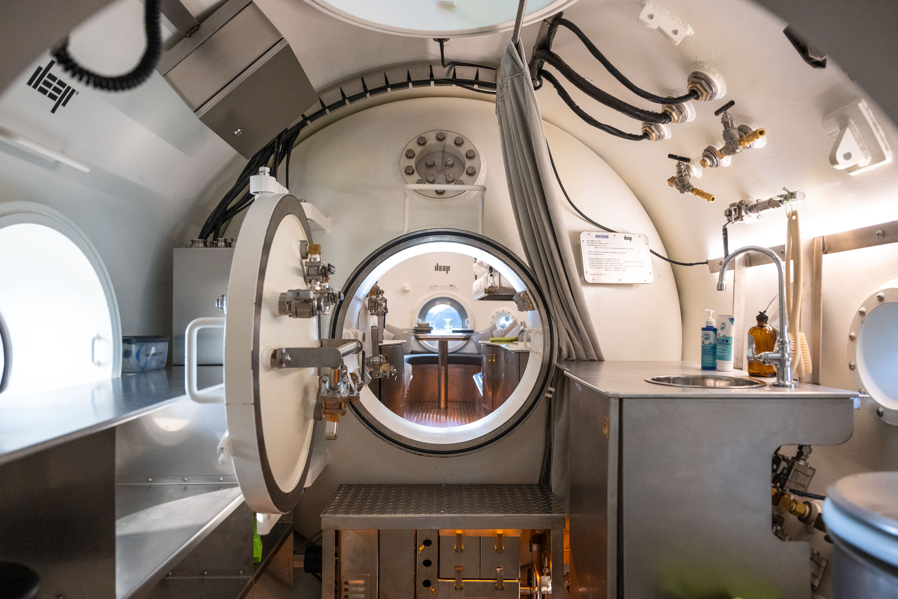 An interior view of Vanguard during Life Under The Sea: Ocean Engineering and Technology Company DEEP's unveiling of Vanguard, its pilot subsea human habitat at The Hangar at Regatta Harbour on October 29, 2025 in Miami, Florida.