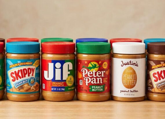 Photo of multiple peanut butter jars and brands on a table