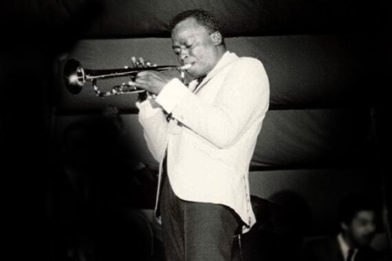 Photo of Miles Davis playing the trumpet